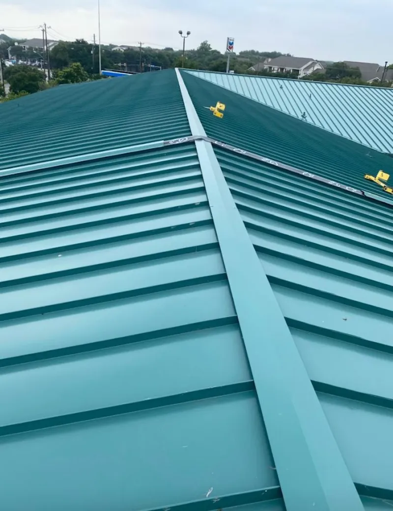 Green commercial metal roof ridge and valley for Metal Roof Repair in Norwell