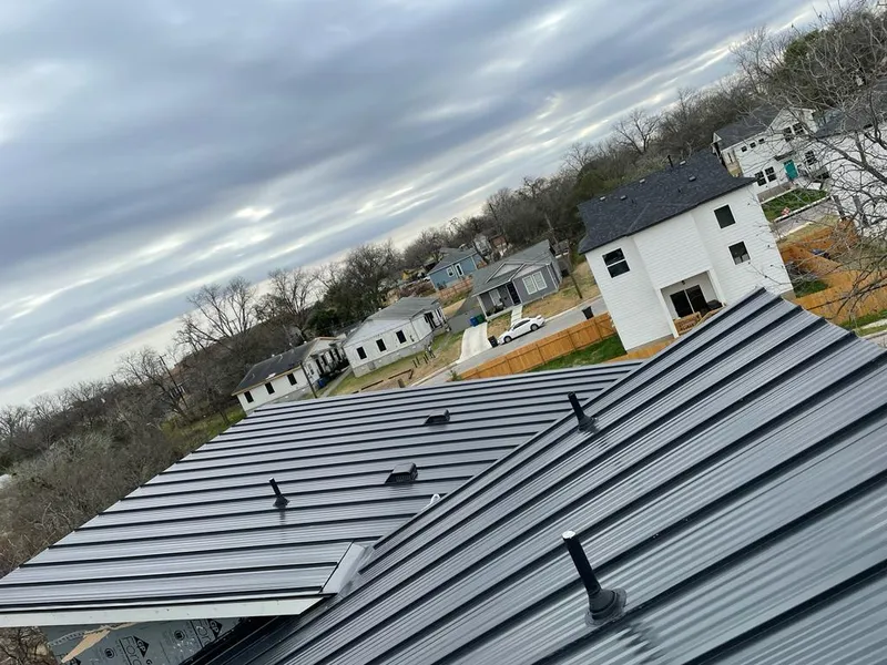 Standing seam metal roof panels with vents for Skylight Repair in Norwell